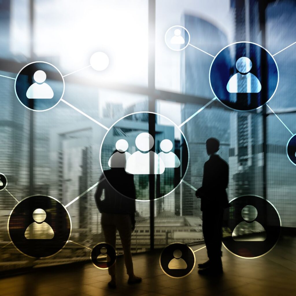 Abstract business network illustration showing interconnected user icons over a cityscape background, representing professional connections and collaboration.